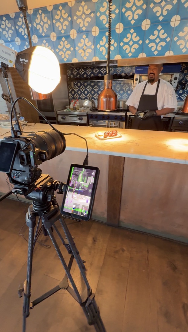 CLEAN.COMPS camera setup filming a commercial venue production